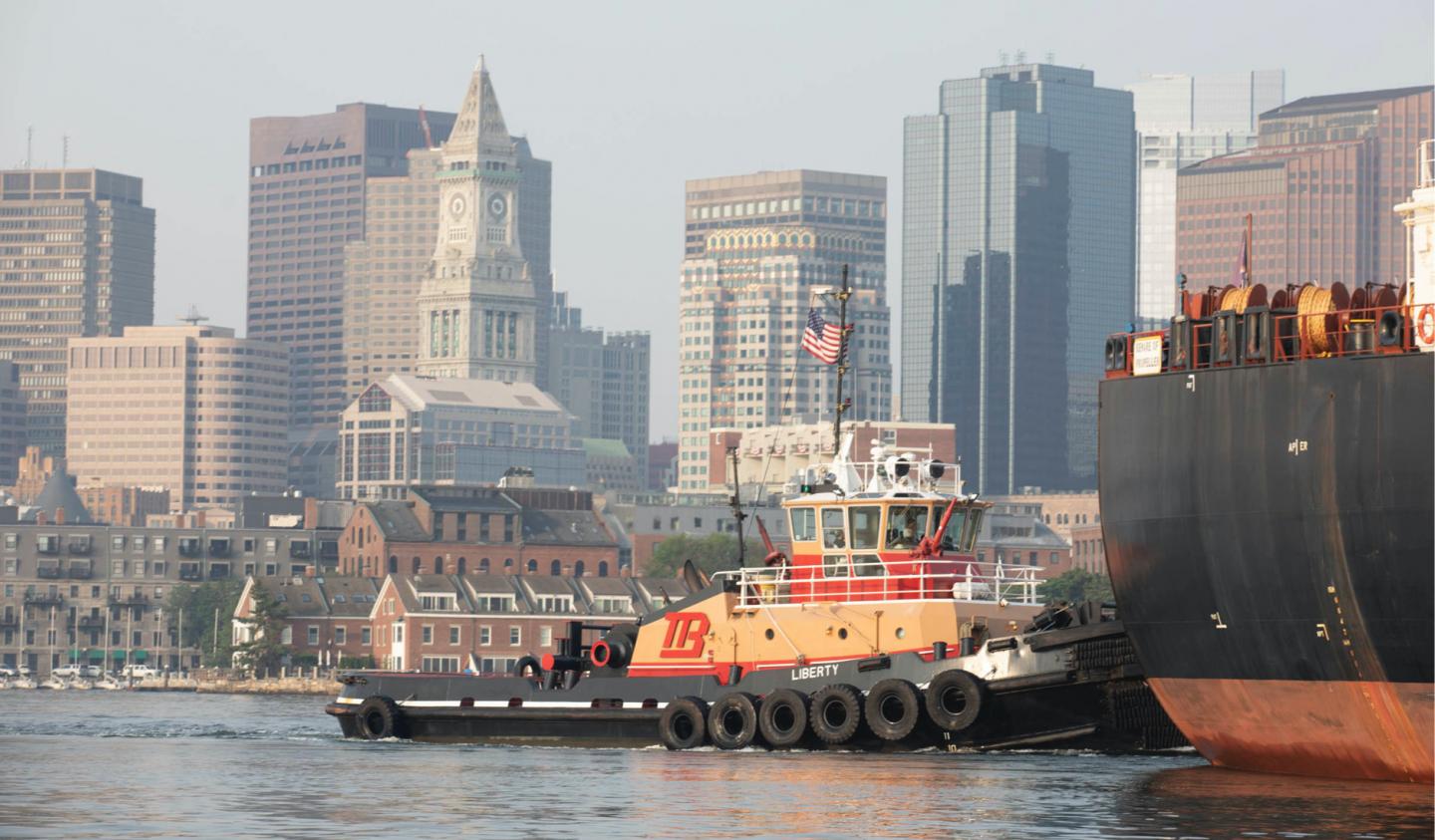 Barges with Boston city